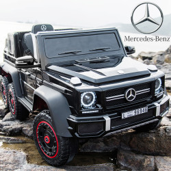 Акумулаторен джип Mercedes G63 AMG 6X6 с дистанционно управление и отварящи се врати 12V Акумулаторен джип Mercedes G63 AMG 6X6 с дистанционно управление и отварящи се врати 12V